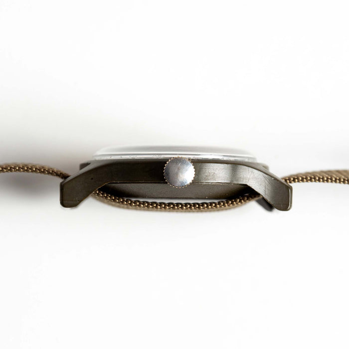 flatlay of the 1991 Timex Camper, shown from the side