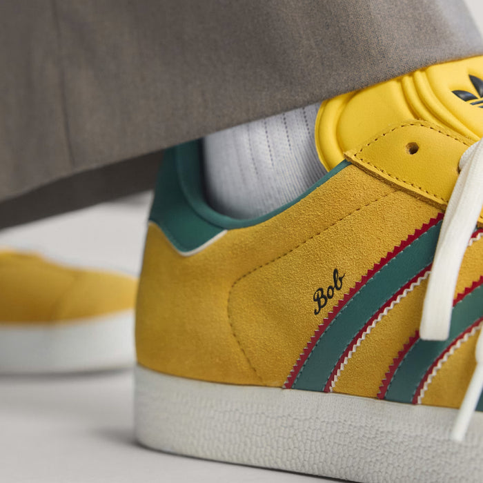 Gazelle Jamaica x Bob Marley Mens Lifestyle Shoes (Bold Gold/None/Pure Ruby)