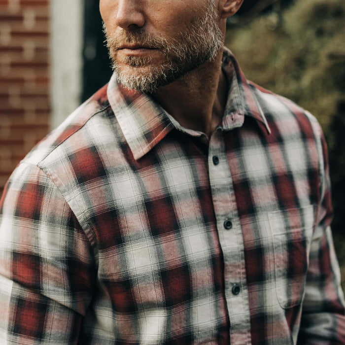 fit model showing off the buttons on The California in Brick Plaid Ombre Twill