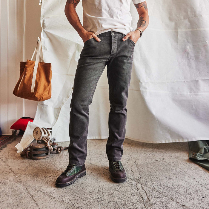 fit model posing in The Camp Pant in Soil Chipped Canvas