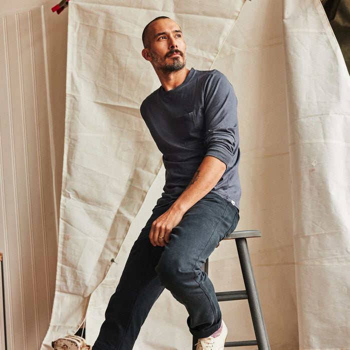 fit model posing in The Cotton Hemp Long Sleeve Tee in Navy