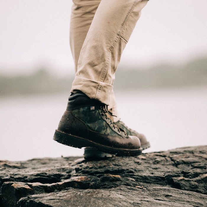 fit model showing off the side of The Ridge Boot in Painted Camo