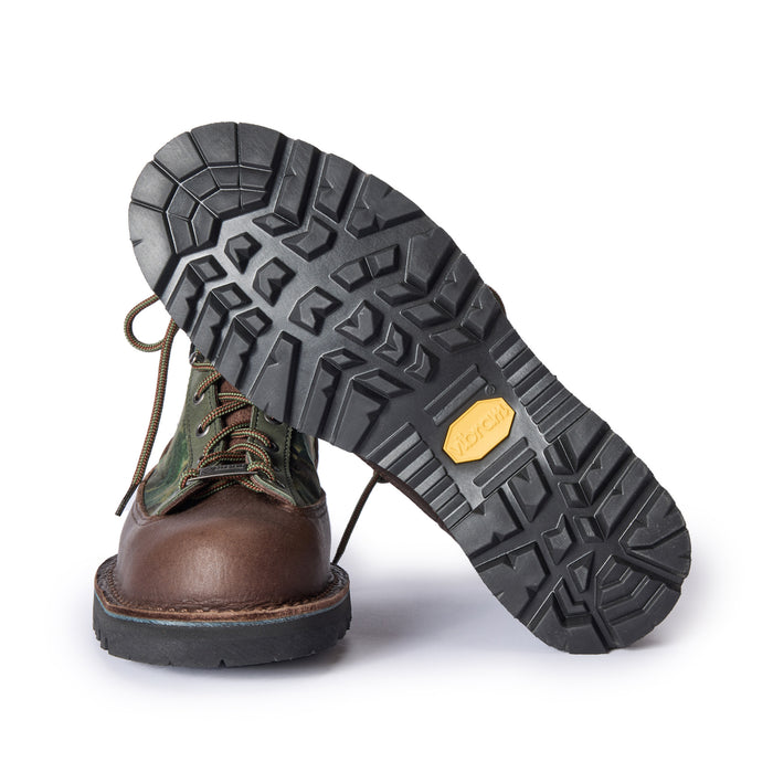 material shot of the vibram soles of The Ridge Boot in Painted Camo