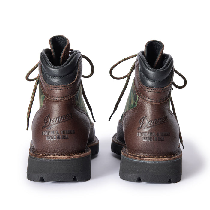 material shot of the Danner logo on the back of The Ridge Boot in Painted Camo