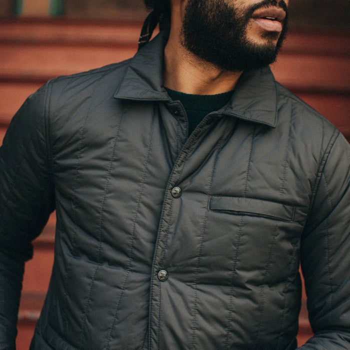 fit model wearing The Decker Jacket in Charcoal Quilt, chest shot