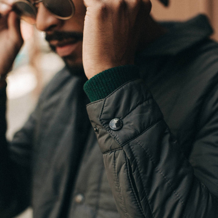 fit model wearing The Decker Jacket in Charcoal Quilt, sleeve