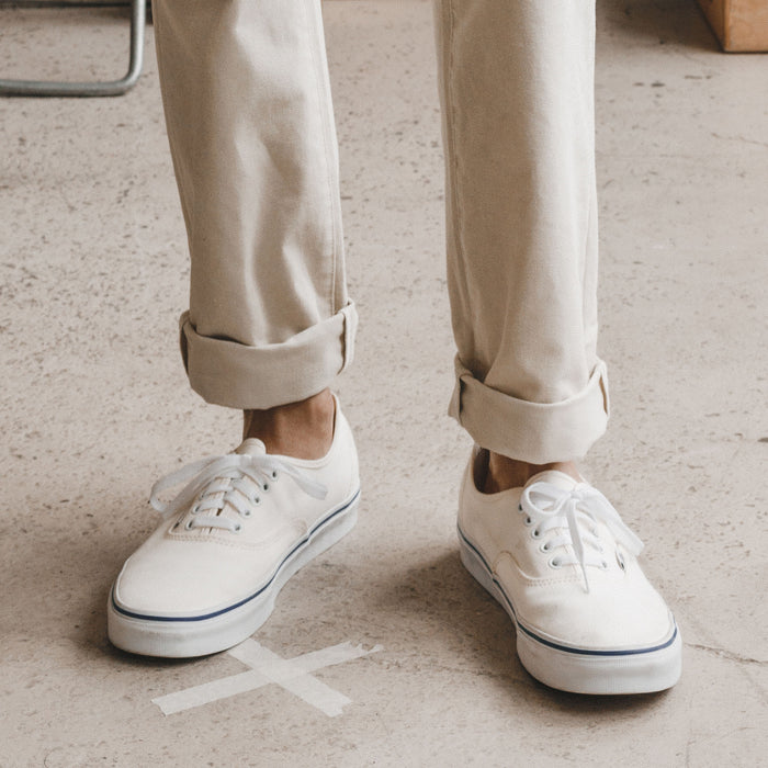 fit model with rolled up cuffs in The Democratic All Day Pant in Dune Canvas