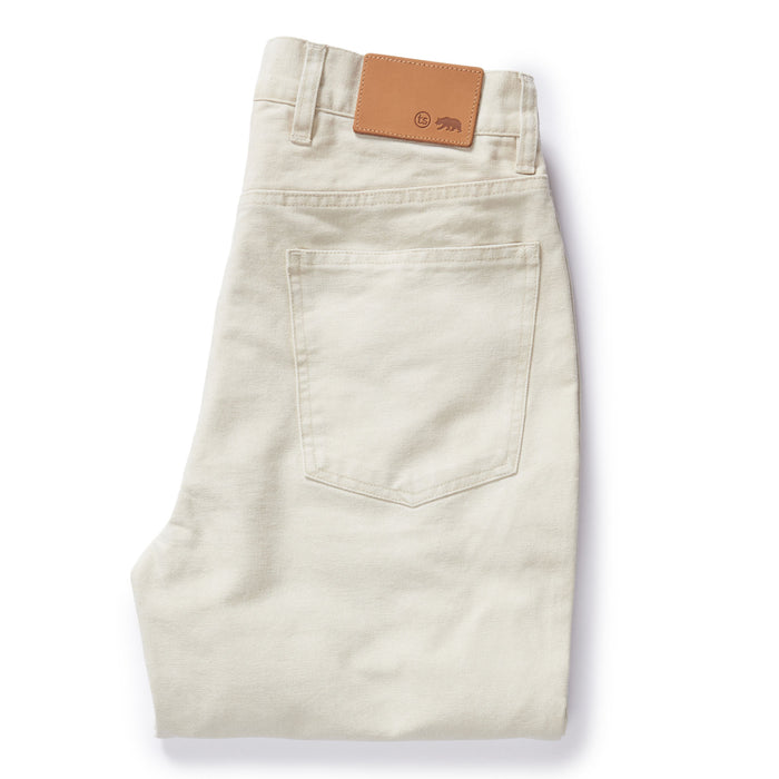 flatlay of The Democratic All Day Pant in Dune Canvas, folded from the back