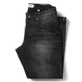 flatlay of The Democratic Jean in Black 3-Month Wash Selvage folded