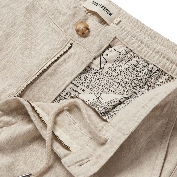 material shot of the SF map printing  and internal drawstring on The Easy Pant in Natural Herringbone