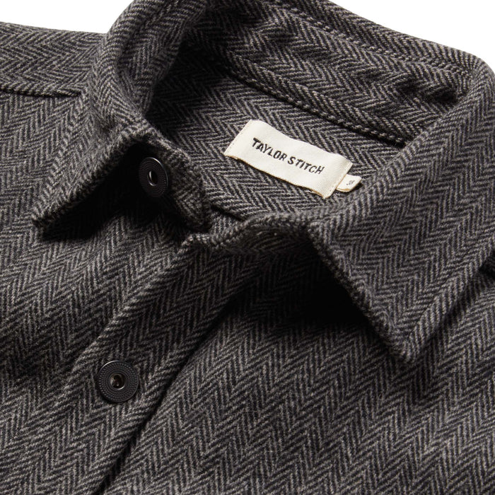 material shot of The Explorer Shirt in Coal Herringbone Wool showing interior label