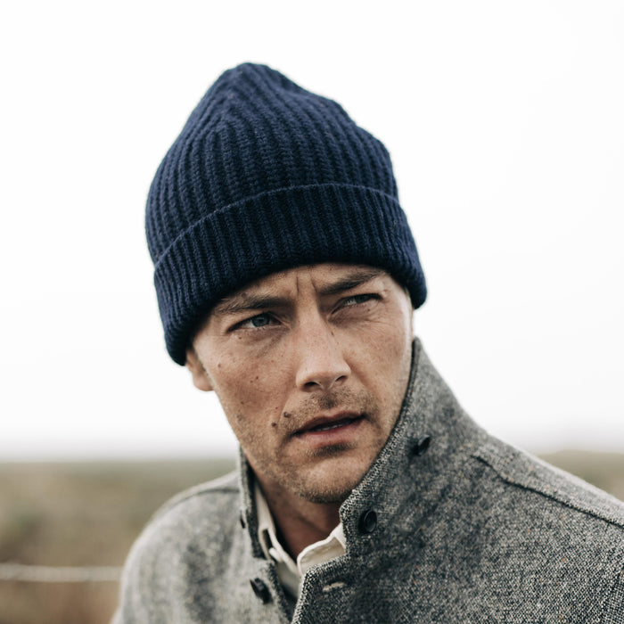 fit model wearing The Fisherman Beanie in Dark Navy