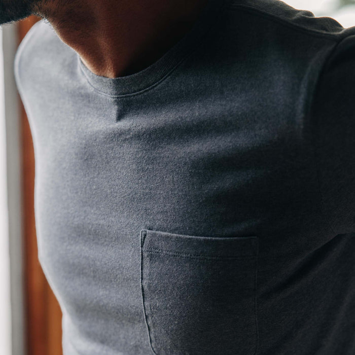 fit model showing chest pocket of The Heavy Bag Tee in Storm