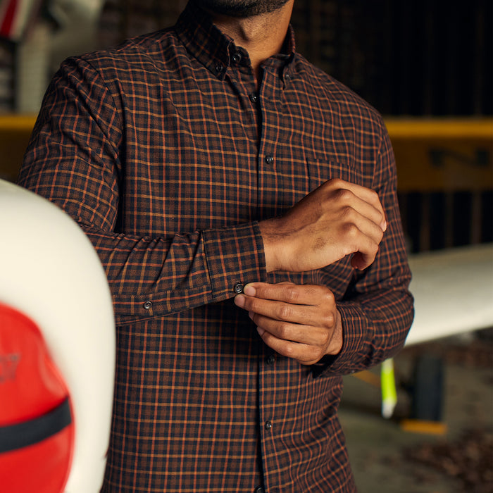 ft model adjusting the sleeves of The Jack in Academy Plaid