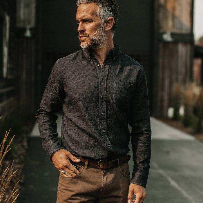 fit model wearing The Jack in Coal Double Cloth, looking left