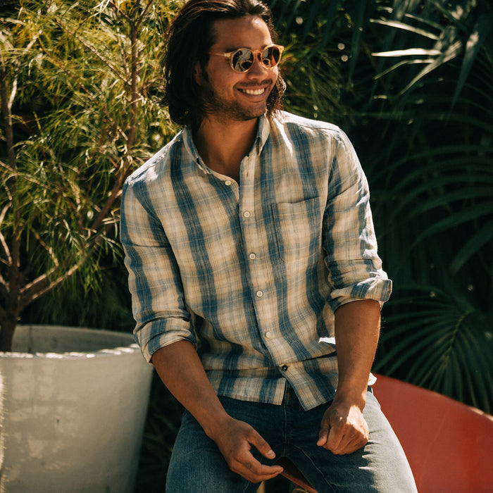 fit model sitting in The Jack in Iceberg Plaid