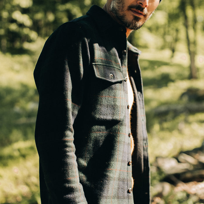 fit model showing the side of The Maritime Shirt in Saltwater Plaid
