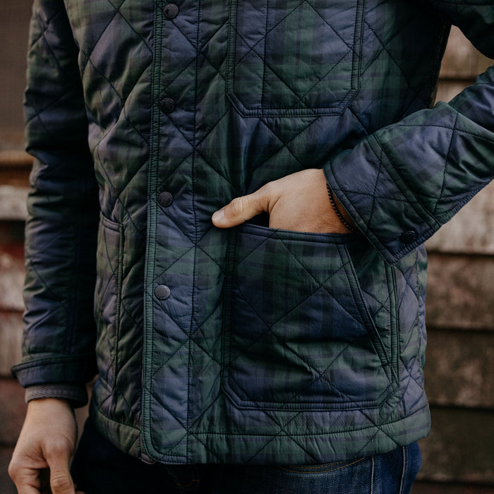 fit model with his hand in the front pockets of The Ojai Jacket in Blackwatch Plaid Diamond Quilt