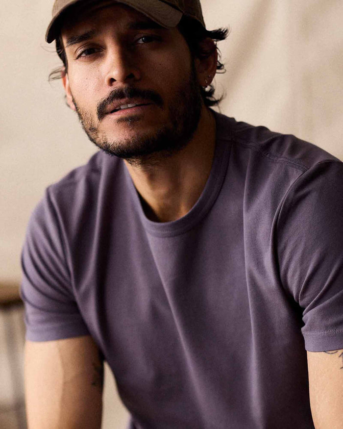 fit model showing the front of The Organic Cotton Tee in Dried Plum