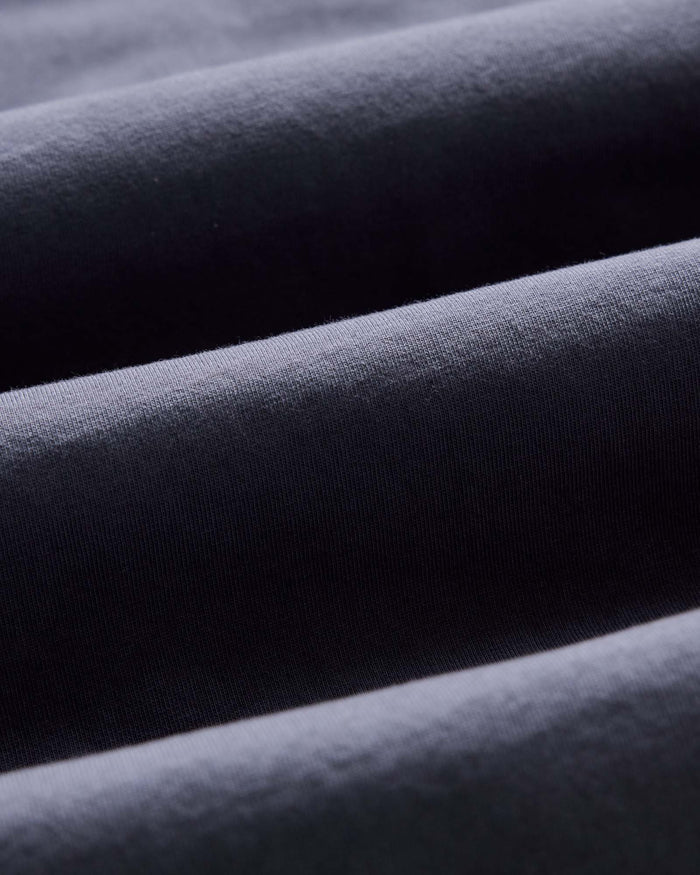 material shot of the sleeve on The Organic Cotton Tee in Navy