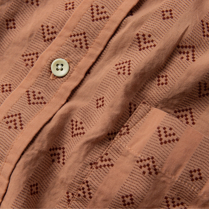 material shot of chest pocket and button