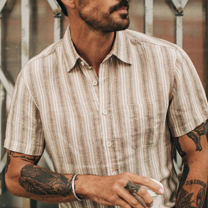 fit model wearing The Short Sleeve California in Desert Shadow Stripe, looking right