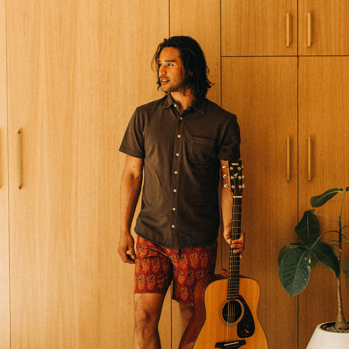 fit model standing in The Short Sleeve California in Espresso Pique