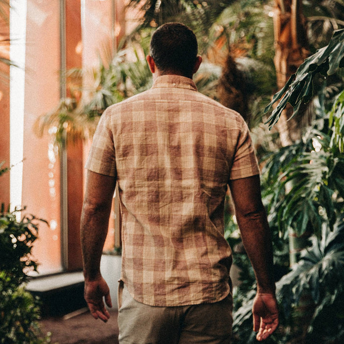 fit model wearing The Short Sleeve Jack in Red Madras, back shot