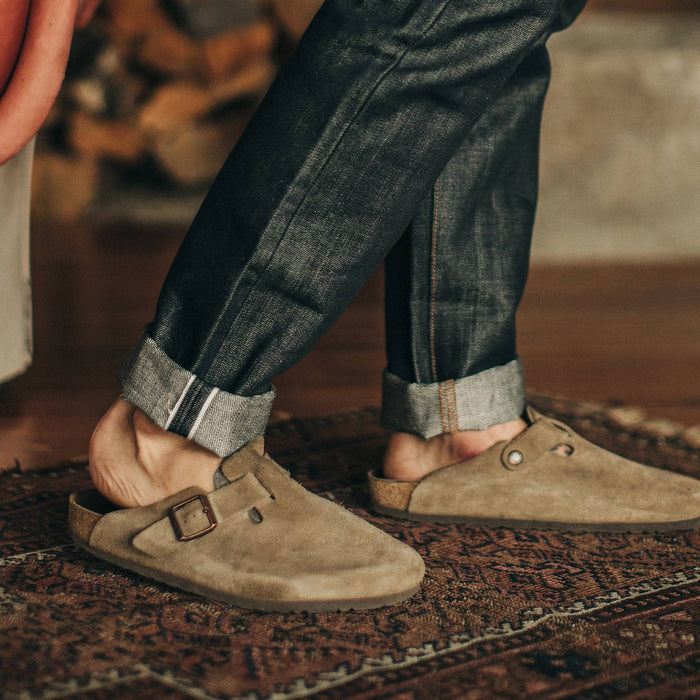 fit model wearing The Slim Jean in Nihon Menpu Selvage, cuffed with birks