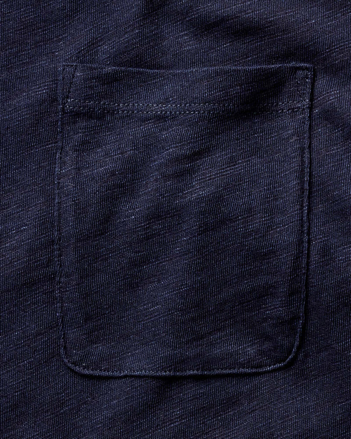 folded flatlay of The Organic Cotton Tee in Rinsed Indigo