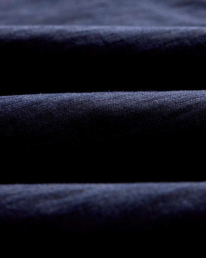 material shot of the collar on The Organic Cotton Tee in Rinsed Indigo