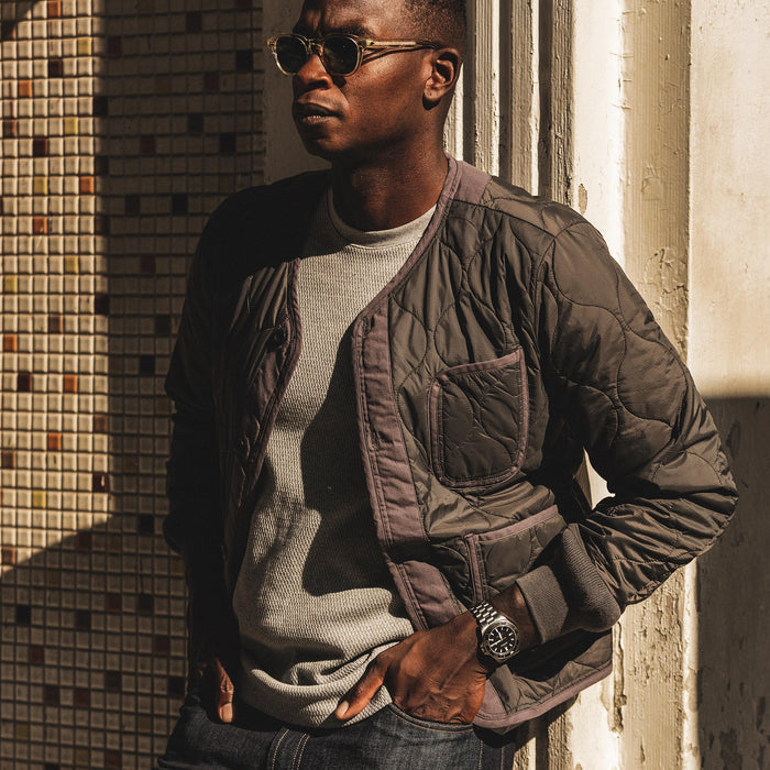 our fit model wearing The Taylor Stitch x Alpha Industries ALS/92 in Raven—hands in pocket