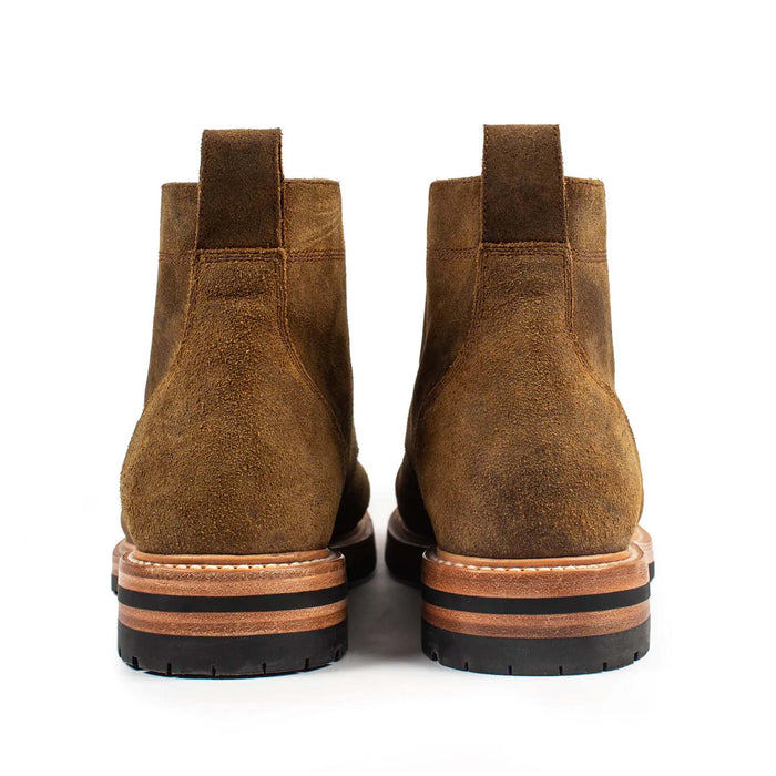 material shot of the back of The Trench Boot in Golden Brown Waxed Suede