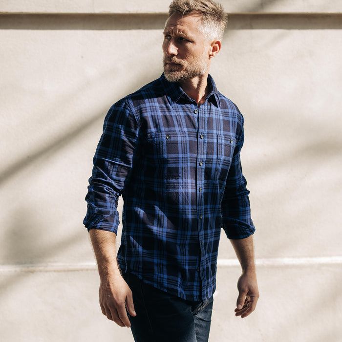 fit model walking in The Utility Shirt Rinsed Indigo Plaid