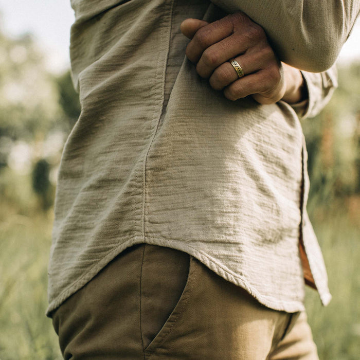 fit model showing the side of The Utility Shirt in Stone Double Cloth