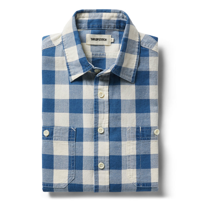 flatlay of The Utility Shirt in Sun Bleached Indigo Check folded
