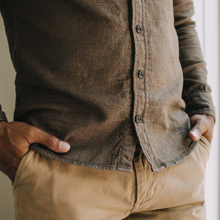 fit model showing the buttons on The Utility Shirt in Walnut Double Cloth
