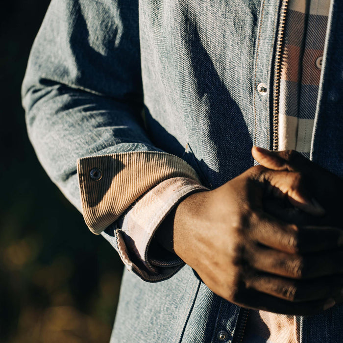 fit model showing the cuffs on The Workhorse Jacket in Fletcher Wash Organic Selvage